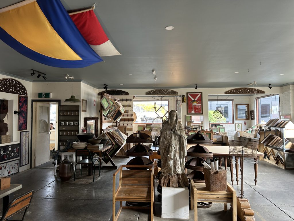 Inside Mulbury, a multi-purpose art studio, gallery and retail business in Highett, displaying a variety of frames, art works and statues