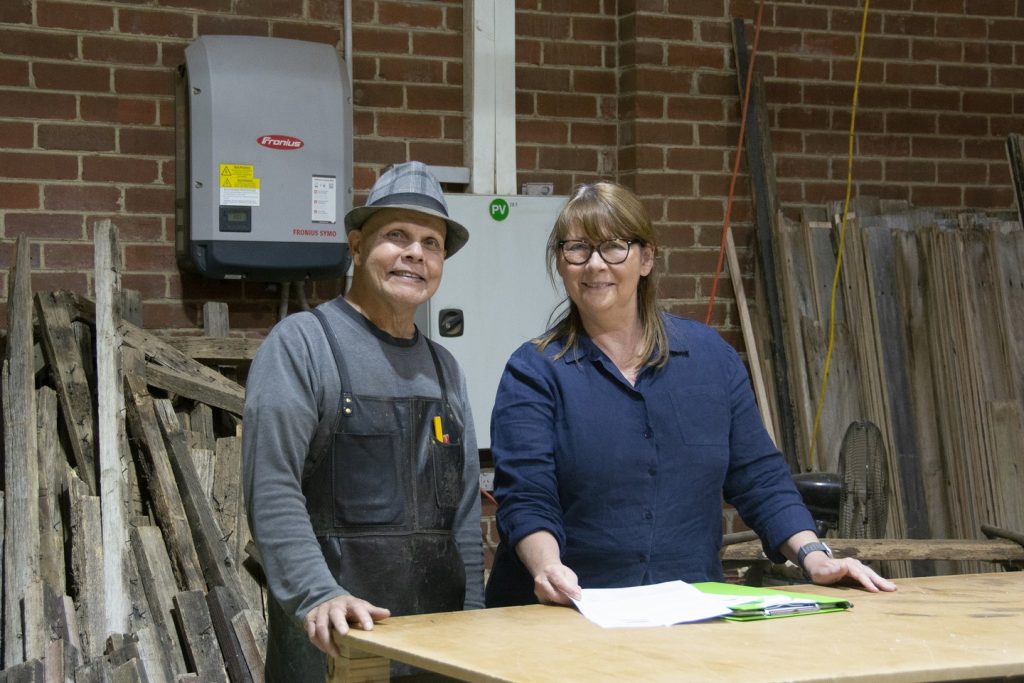 Gerard Melder, owner of Mulbury in Highett, with Danielle King of Green Moves, discussing viable options to maximise energy efficiency and savings during an energy assessment.