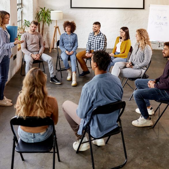 A sustainability consultant running a materiality assessment workshop with a business