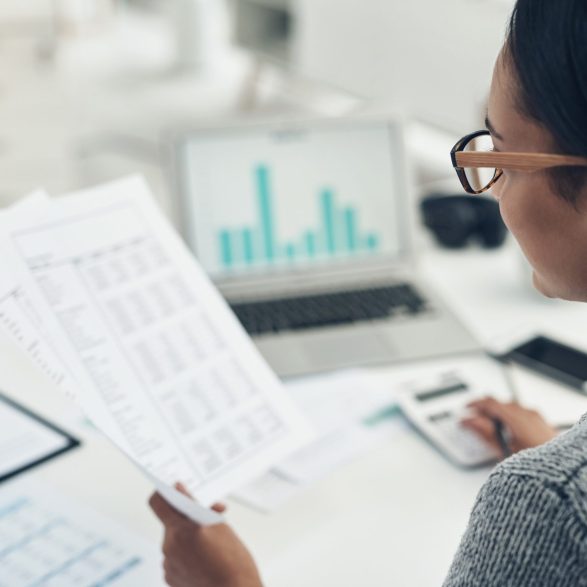 A sustainability consultant working on a materiality assessment report