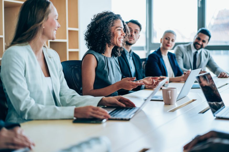 Group of business persons in business meeting. Group of entrepreneurs on meeting in board room. Corporate business team on meeting in the office.