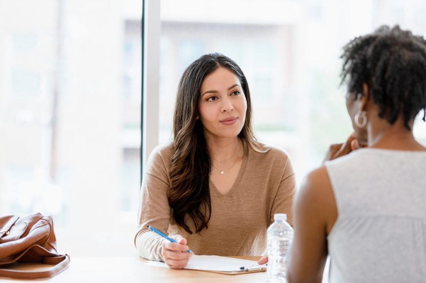 A sustainability consultant providing advice to a business client